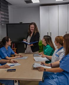 Graduation cap resting on books
